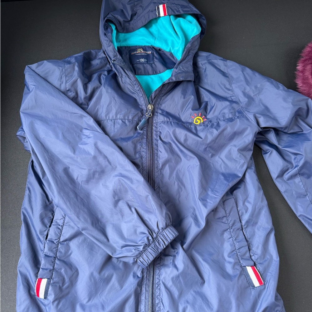 Kids rain Jacket size 8 jingle bongala